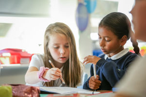 Bayards 2 girls writing